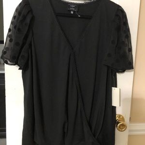 Black loose fitting dress shirt cross top front